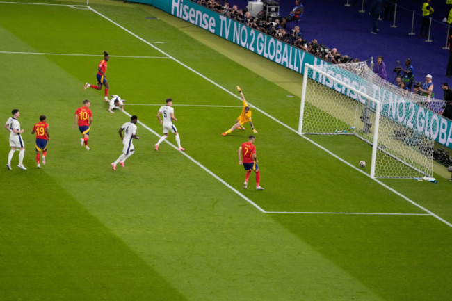 spains-nico-williams-top-scores-his-sides-first-goal-against-england-during-the-final-match-at-the-euro-2024-soccer-tournament-in-berlin-germany-sunday-july-14-2024-ap-photothanassis-stavra