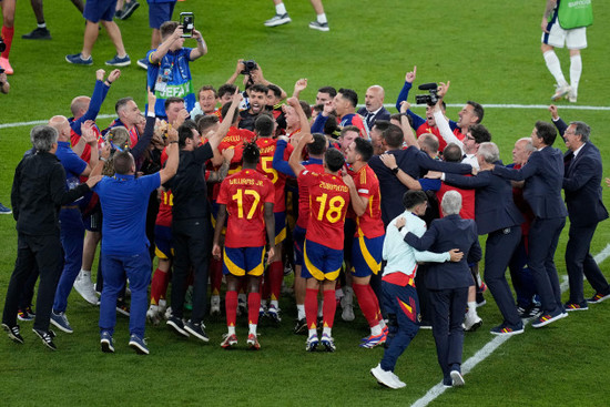 spains-players-celebrate-after-their-team-defeated-england-2-1-at-the-end-of-the-final-match-at-the-euro-2024-soccer-tournament-in-berlin-germany-sunday-july-14-2024-ap-photothanassis-stavraki