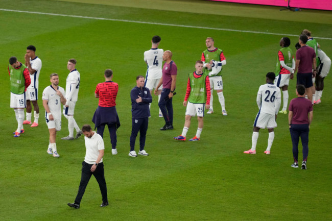 englands-players-react-at-the-end-of-the-final-match-against-spain-at-the-euro-2024-soccer-tournament-in-berlin-germany-sunday-july-14-2024-spain-won-the-game-2-1-ap-photothanassis-stavrakis