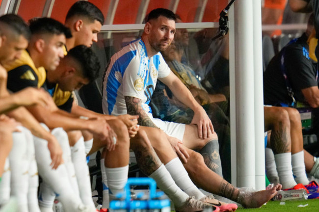 argentinas-lionel-messi-sits-on-the-bench-after-leaving-the-field-injured-during-the-copa-america-final-soccer-match-against-colombia-in-miami-gardens-fla-sunday-july-14-2024-ap-photojulio-co