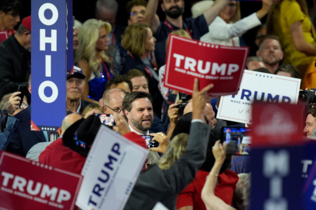 republican-vice-presidential-candidate-sen-jd-vance-r-ohio-center-is-introduced-during-the-first-day-of-the-republican-national-convention-monday-july-15-2024-in-milwaukee-ap-photoj-scott-a