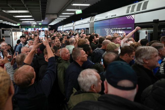 soccer-fans-gather-on-train-station-ahead-the-group-c-match-between-serbia-and-england-at-the-euro-2024-soccer-tournament-in-gelsenkirchen-germany-sunday-june-16-2024-ap-photomarkus-schreiber