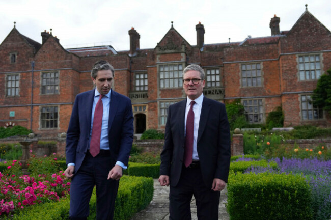 british-prime-minister-keir-starmer-right-and-irish-taoiseach-simon-harris-walk-through-the-garden-at-chequers-in-aylesbury-england-wednesday-july-17-2024-it-was-the-first-face-to-face-meeting-f