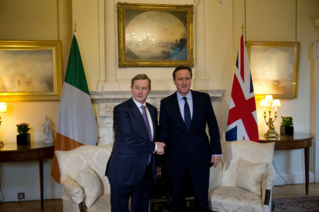 british-prime-minister-david-cameron-right-performs-a-posed-handshake-for-the-media-with-irelands-prime-minister-enda-kenny-at-the-start-of-their-meeting-at-10-downing-street-in-london-monday-jan