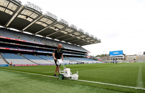 groundman-darren-jepson-marking-the-pitch-ahead-of-the-game