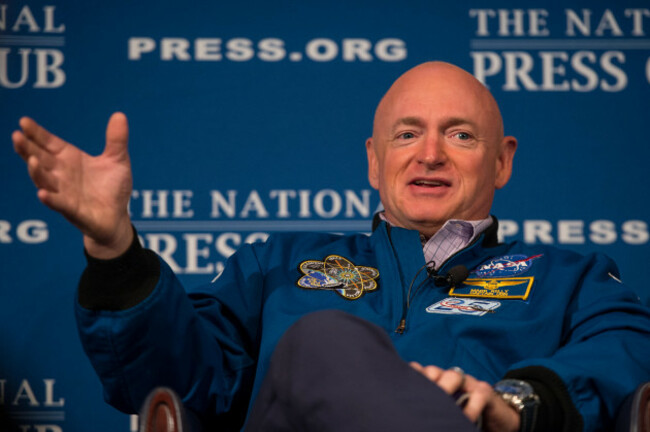 retired-astronaut-mark-kelly-talks-during-a-discussion-with-astronaut-terry-virts-national-press-club-president-john-hughs-and-kellys-twin-bother-scott-kelly-who-is-currently-onboard-the-internati