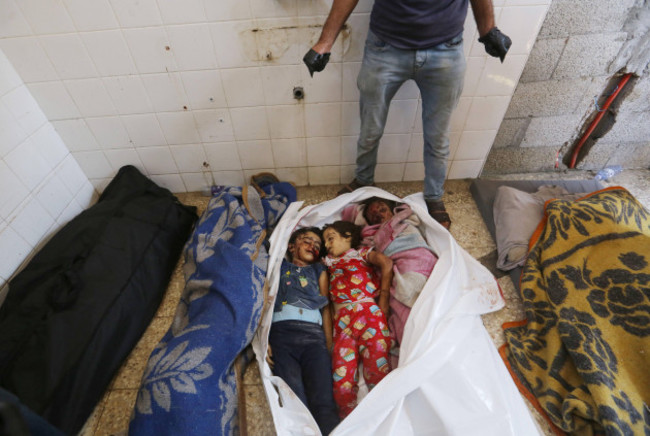 bodies-of-the-palestinians-who-lost-their-lives-after-israeli-attack-hits-the-house-belonging-to-the-al-raii-family-bodies-of-the-palestinians-who-lost-their-lives-after-israeli-attack-hits-the-house