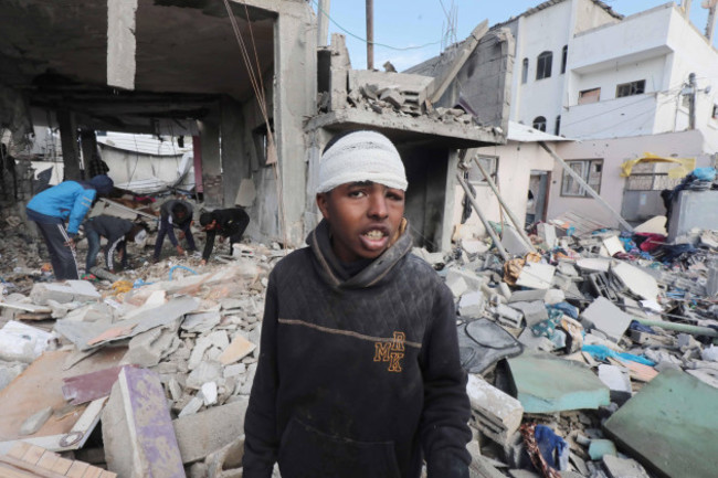 palestinians-inspect-destruction-after-an-israeli-bombing-of-el-rawagh-family-house-in-nusairat-palestinians-inspect-destruction-after-an-israeli-bombing-of-el-rawagh-family-house-in-nusairat-gaza