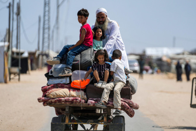 palestinians-displaced-by-the-israeli-air-and-ground-offensive-on-the-gaza-strip-flee-from-parts-of-khan-younis-following-an-evacuation-order-by-the-israeli-army-to-leave-parts-of-the-southern-area-o