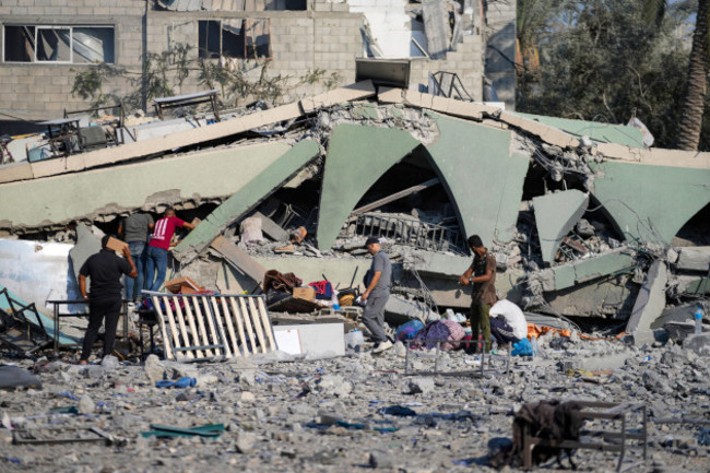 palestinians-inspect-the-rubble-of-a-school-destroyed-in-an-israeli-airstrike-on-deir-al-balah-central-gaza-strip-saturday-july-27-2024-ap-photoabdel-kareem-hana