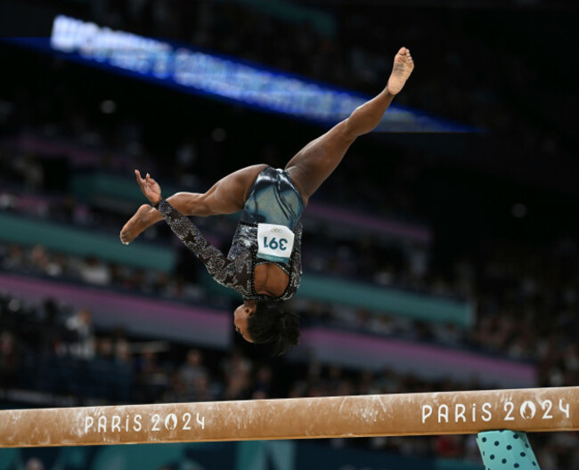 simone-biles-of-united-states-performs-during-balance-beam-of-artistic-gymnastics-womens-qualification-at-bercy-arena-in-paris-france-on-july-28-2024-the-yomiuri-shimbun-via-ap-images