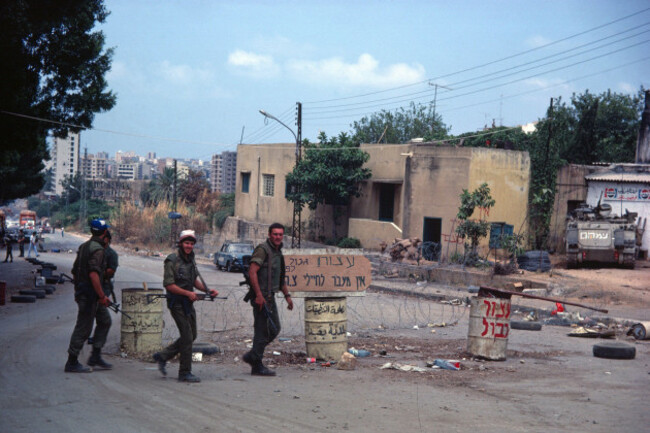 israeli-soldiers-walk-at-the-last-checkpoint-between-west-and-east-beirut-which-separated-the-mainly-muslim-factions-in-predominantly-muslim-west-beirut-from-the-predominantly-christian-east-beirut-co