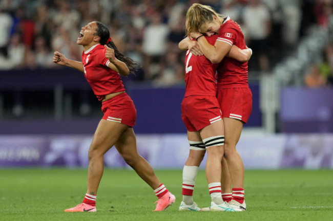 canadas-asia-hogan-rochester-left-reacts-after-winning-their-womens-quarterfinal-rugby-sevens-match-between-france-and-canada-at-the-2024-summer-olympics-in-the-stade-de-france-in-saint-denis-f