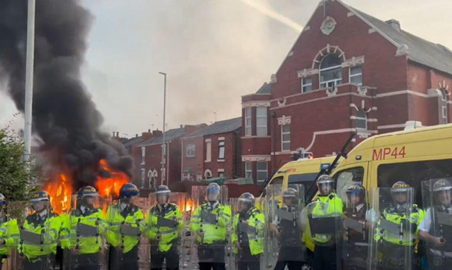 a-police-van-set-alight-as-trouble-flares-during-a-protest-in-southport-after-three-children-died-and-eight-were-injured-in-a-ferocious-knife-attack-during-a-taylor-swift-event-at-a-dance-school-on