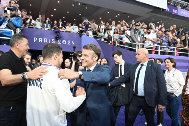 paris-france-27th-july-2024-antoine-dupont-and-french-president-emmanuel-macron-celebrate-frances-victory-during-the-rugby-7s-match-between-france-and-fiji-at-the-paris-2024-olympic-games-at-the