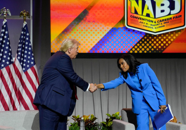 republican-presidential-candidate-former-president-donald-trump-shakes-hands-with-abcs-rachel-scott-at-the-national-association-of-black-journalists-nabj-convention-wednesday-july-31-2024-in-c