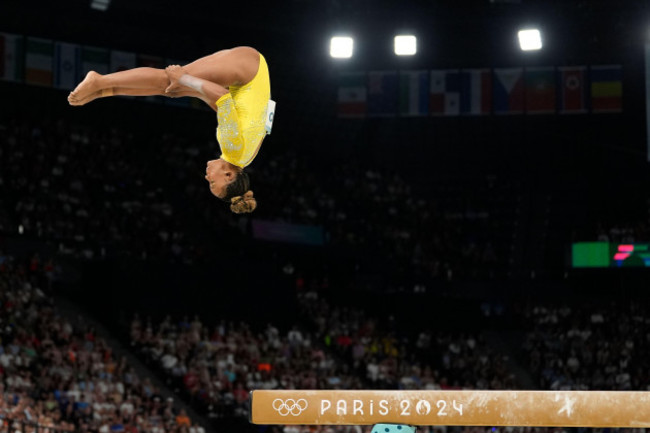 rebeca-andrade-of-brazil-performs-on-the-balance-beam-during-the-womens-artistic-gymnastics-all-around-finals-in-bercy-arena-at-the-2024-summer-olympics-thursday-aug-1-2024-in-paris-france