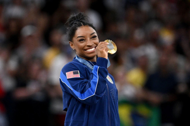 paris-france-01st-aug-2024-simone-biles-of-the-usa-after-being-presented-the-gold-medal-in-the-gymnastics-womens-all-around-final-at-bercy-arena-as-part-of-the-2024-paris-olympic-games-in-paris