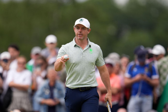 rory-mcilroy-of-ireland-acknowledges-the-crowd-after-after-putting-on-the-3rd-green-during-the-third-round-of-the-mens-golf-event-at-the-2024-summer-olympics-saturday-aug-3-2024-at-le-golf-nat