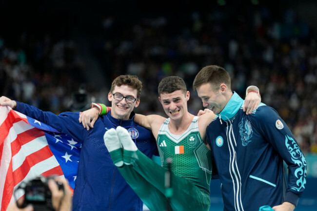 from-left-to-right-bronze-medalist-stephen-nedoroscik-of-the-united-states-gold-medalist-rhys-mcclenaghan-of-ireland-and-silver-medalist-nariman-kurbanov-of-kazakhstan-celebrate-on-the-podium-a