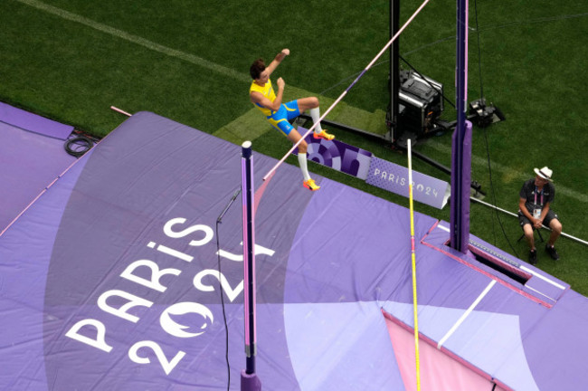 armand-duplantis-of-sweden-competes-in-the-mens-pole-vault-qualification-at-the-2024-summer-olympics-saturday-aug-3-2024-in-saint-denis-france-ap-photodavid-j-phillip