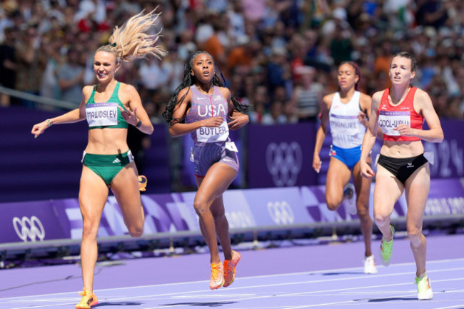 sharlene-mawdsley-of-ireland-aaliyah-butler-of-the-united-states-lurdes-gloria-manuel-of-czechia-and-susanne-gogl-walli-of-austria-cross-the-finish-line-in-a-womens-400-meters-round-1-heat-at