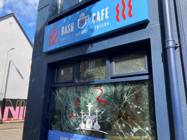 scenes-around-the-bash-cafe-on-donegall-road-in-south-belfast-which-was-burned-on-saturday-night-following-violent-disorder-which-broke-out-after-an-anti-immigration-protest-in-the-city-picture-date