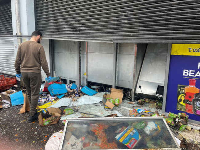 a-supermarket-badly-damaged-by-fire-on-the-donegall-road-in-south-belfast-following-disorder-which-followed-anti-immigration-protests-in-the-city-picture-date-sunday-august-4-2024