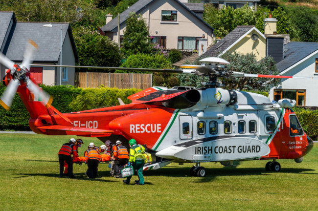 rosscarbery-west-cork-ireland-17th-july-2021-the-irish-coast-guard-helicopter-rescue-116-has-this-afternoon-airlifted-a-patient-from-rosscarbery-gaa-club-to-cork-airport-and-then-onto-cork-univ