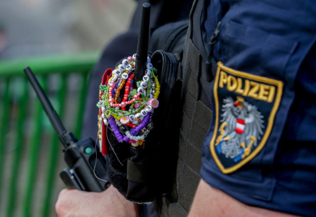 an-austrian-police-officer-is-decorated-with-bracelets-in-the-city-centre-in-vienna-on-thursday-aug-8-2024-organizers-of-three-taylor-swift-concerts-in-the-stadium-in-vienna-this-week-called-them-o