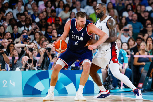 nikola-jokic-of-serbia-and-lebron-james-of-united-states-in-action-during-the-mens-semifinal-basketball-match-between-united-states-and-serbia-at-bercy-arena-during-the-paris-2024-olympics-games-on-a