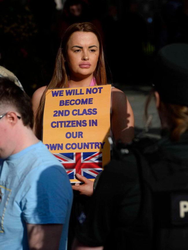 people-talking-part-in-an-anti-immigration-protest-in-belfast-city-centre-picture-date-friday-august-9-2024