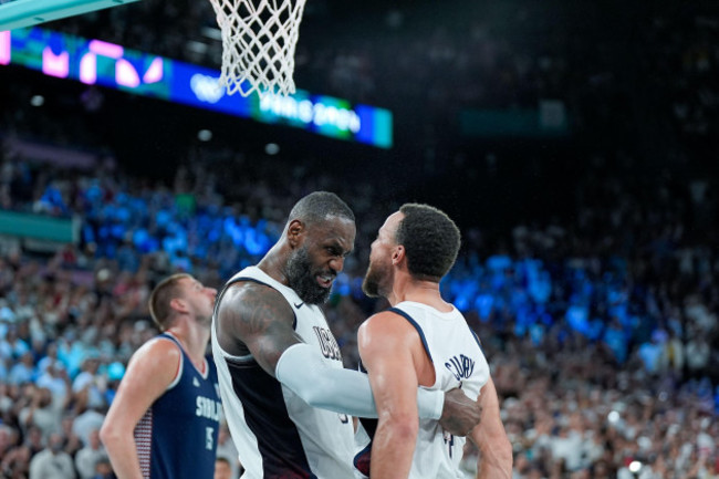 paris-france-08th-aug-2024-paris-france-august-8-lebron-james-of-united-states-and-stephen-curry-of-the-united-states-celebrate-during-the-mens-semifinal-game-between-united-states-and-serbia