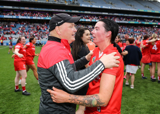 ger-manley-celebrates-after-the-game-with-ashling-thompson