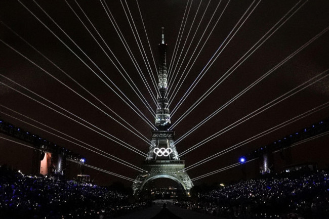 a-light-show-is-projected-from-the-eiffel-tower-in-paris-france-during-the-opening-ceremony-of-the-2024-summer-olympics-friday-july-26-2024-ap-photodavid-j-phillip