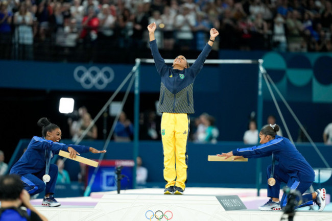 paris-france-05th-aug-2024-paris-france-august-5-silver-medalist-simone-biles-of-united-states-and-bronze-medalist-jordan-chiles-of-the-united-states-celebrate-gold-medalist-rebeca-andrade-of