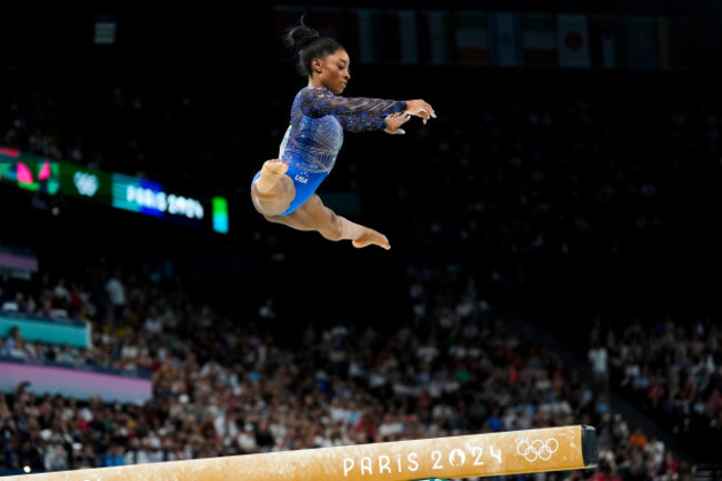 simone-biles-of-the-united-states-performs-on-the-balance-beam-during-the-womens-artistic-gymnastics-all-around-finals-in-bercy-arena-at-the-2024-summer-olympics-thursday-aug-1-2024-in-paris