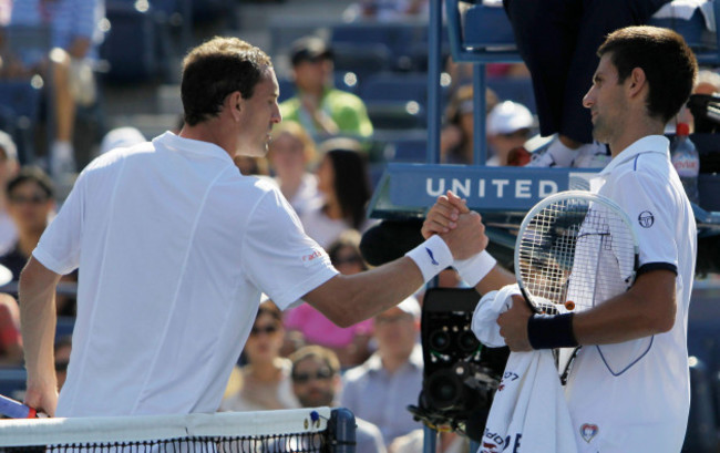 novak-djokovic-of-serbia-shakes-hands-with-conor-niland-of-ireland-after-their-match-in-the-first-round-of-the-u-s-open-tennis-tournament-in-new-york-tuesday-aug-30-2011-ap-photomike-groll