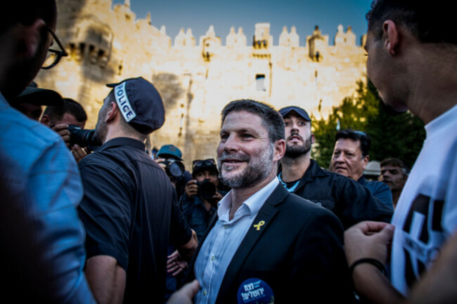 israeli-minister-of-finance-bezalel-smotrich-smiles-outside-damascus-gate-in-jerusalem-thursday-june-5-2024-tens-of-thousands-of-young-religious-ultra-nationalists-zionist-men-and-women-have-parade