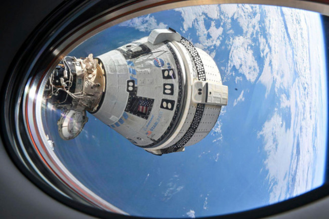 this-photo-provided-by-nasa-shows-boeings-starliner-spacecraft-which-launched-astronauts-butch-wilmore-and-suni-williams-to-the-international-space-station-docked-to-the-harmony-modules-forward-port