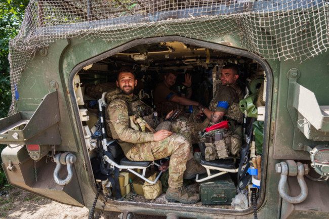 ukrainian-servicemen-sit-inside-their-apc-after-returning-from-russian-kursk-region-near-russian-ukrainian-border-sumy-region-ukraine-wednesday-aug-14-2024-ap-photoevgeniy-maloletka