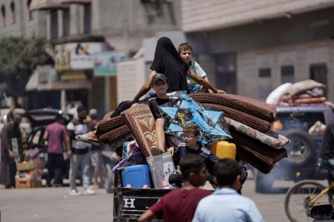 palestinians-evacuate-a-school-that-had-been-their-shelter-in-eastern-deir-al-balah-gaza-strip-friday-aug-16-2024-after-the-israeli-military-dropped-leaflets-asking-civilians-to-evacuate-from-t