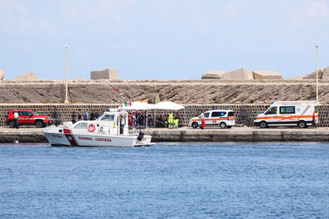 emergency-services-at-the-scene-of-the-search-for-a-missing-boat-in-porticello-santa-flavia-italy-monday-aug-19-2024-british-tech-giant-mike-lynch-his-lawyer-and-four-other-people-are-among-th