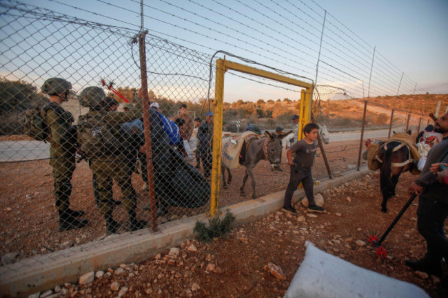 salfit-palestine-2nd-nov-2022-palestinian-farmers-cross-the-gate-of-the-separation-wall-in-the-northern-occupied-west-bank-to-reach-their-lands-confiscated-by-israel-after-the-israeli-army-opened