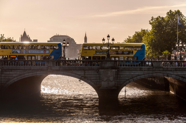 buses-and-pedestrians-on-oconnell-bridge-in-dublin-ireland