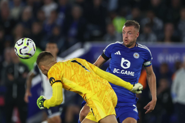 guglielmo-vicario-of-tottenham-hotspur-heads-the-ball-clear-while-under-pressure-from-jamie-vardy-of-leicester-city-during-the-premier-league-match-leicester-city-vs-tottenham-hotspur-at-king-power-st