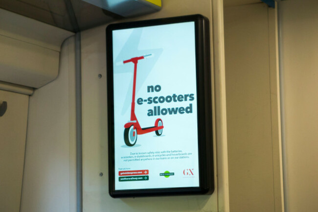 lcd-screen-sign-board-on-a-southern-train-informing-of-e-scooter-and-e-bike-e-cycle-e-bicycle-and-other-electric-cycles-and-scooters-uk-135