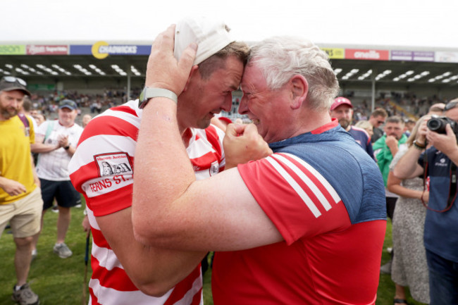 pat-bennett-celebrates-after-the-game-with-ian-byrne