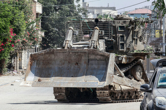 jenin-west-bank-palestine-31st-aug-2024-israeli-bulldozers-drive-in-a-street-during-an-army-raid-in-jenin-the-israeli-army-said-two-palestinians-were-killed-overnight-while-preparing-to-carry-ou