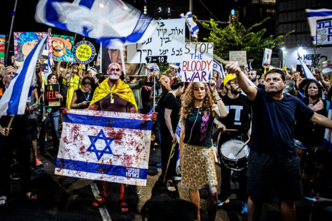 tel-aviv-israel-31st-aug-2024-protestors-wave-the-israeli-flag-during-a-protest-in-tel-aviv-saturday-aug-31-2024-israel-says-its-forces-have-recovered-the-bodies-of-six-hostages-held-by-hamas-in-t